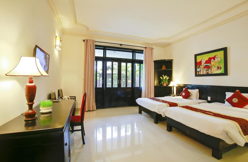 Hoi An Red Frangipani Villa Zimmer foto